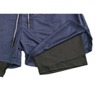 Pantalones cortos deportivos de doble capa para hombre.