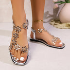 Sandalias Planas de Mujer – Punta Cuadrada, Color Plateado y Adornos Florales